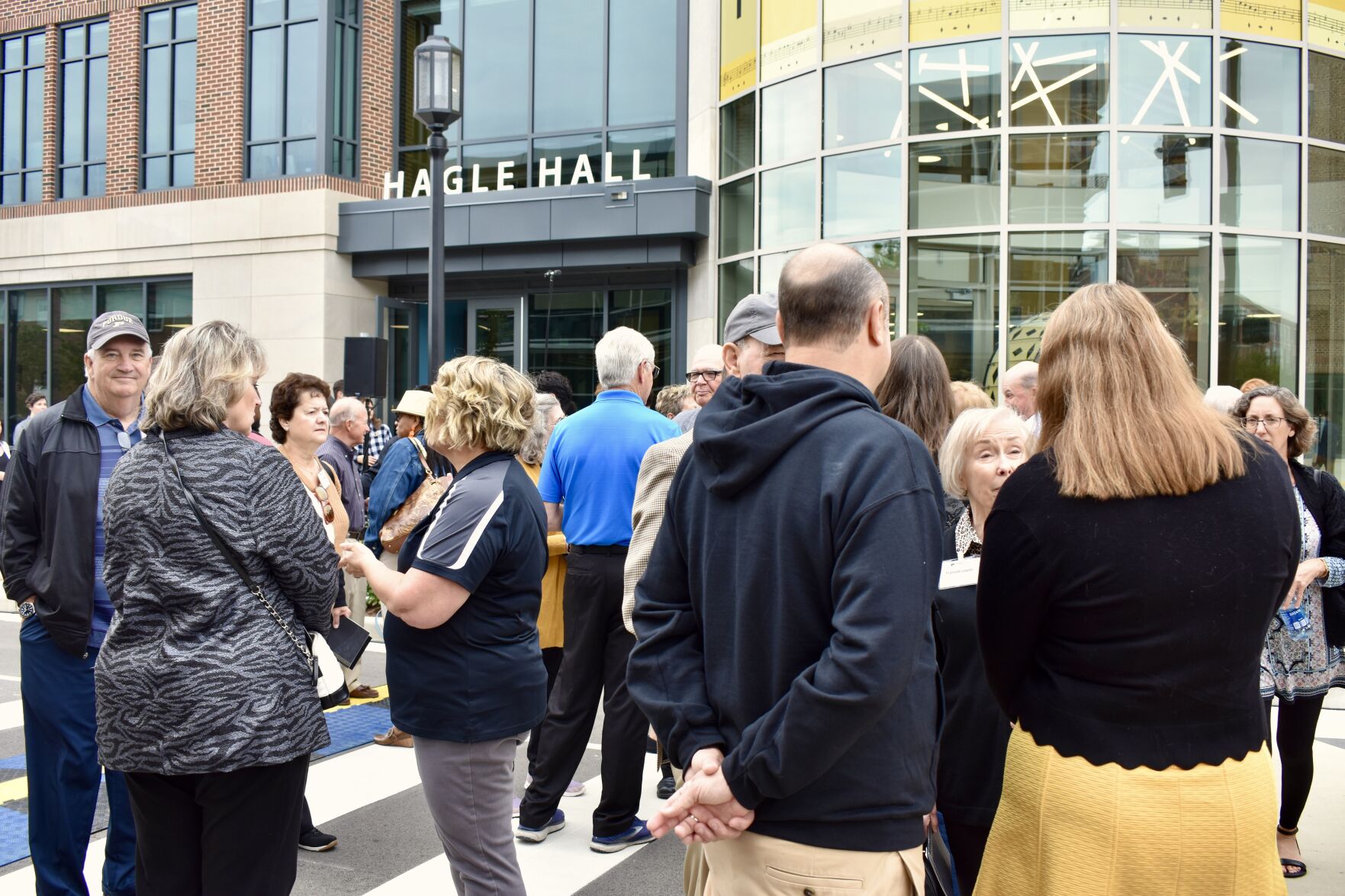 9/23/2022 Hundreds attend dedication of Hagle Hall, Mingling outside Hagle Hall